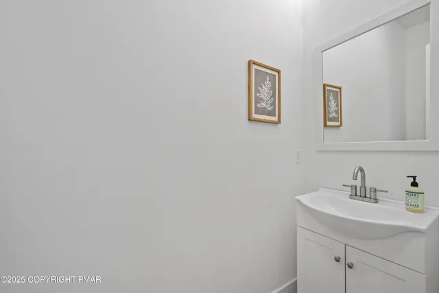 a bedroom with bed and window