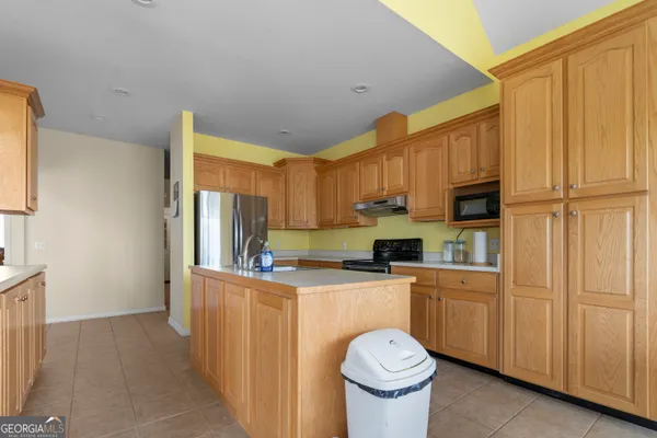 a bath tub sitting next to a window