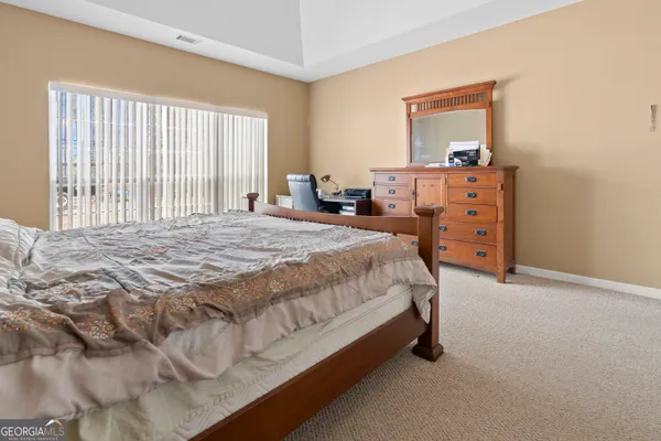a room with furniture and air hockey table