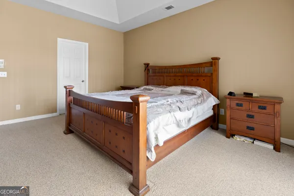 a view of a livingroom with furniture and wooden floor