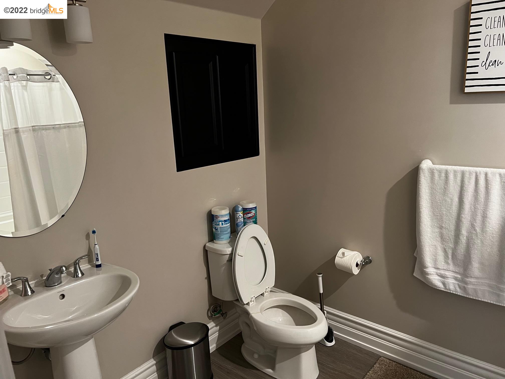 East Garrison Marina, CA 93933 - Photo 4 of 11 a bathroom with a toilet sink and mirror