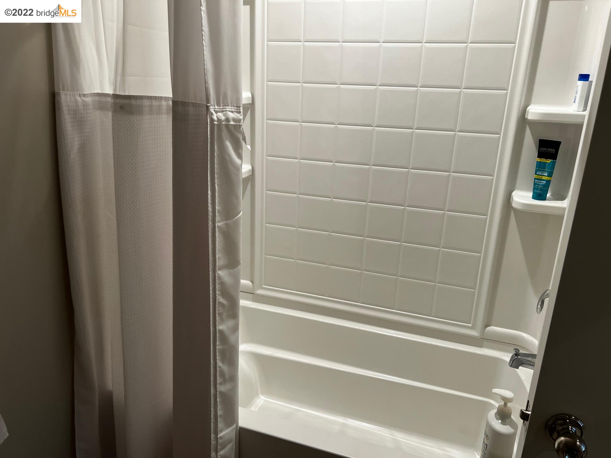 East Garrison Marina, CA 93933 - Photo 5 of 11 a bathroom with a shower and a bath tub