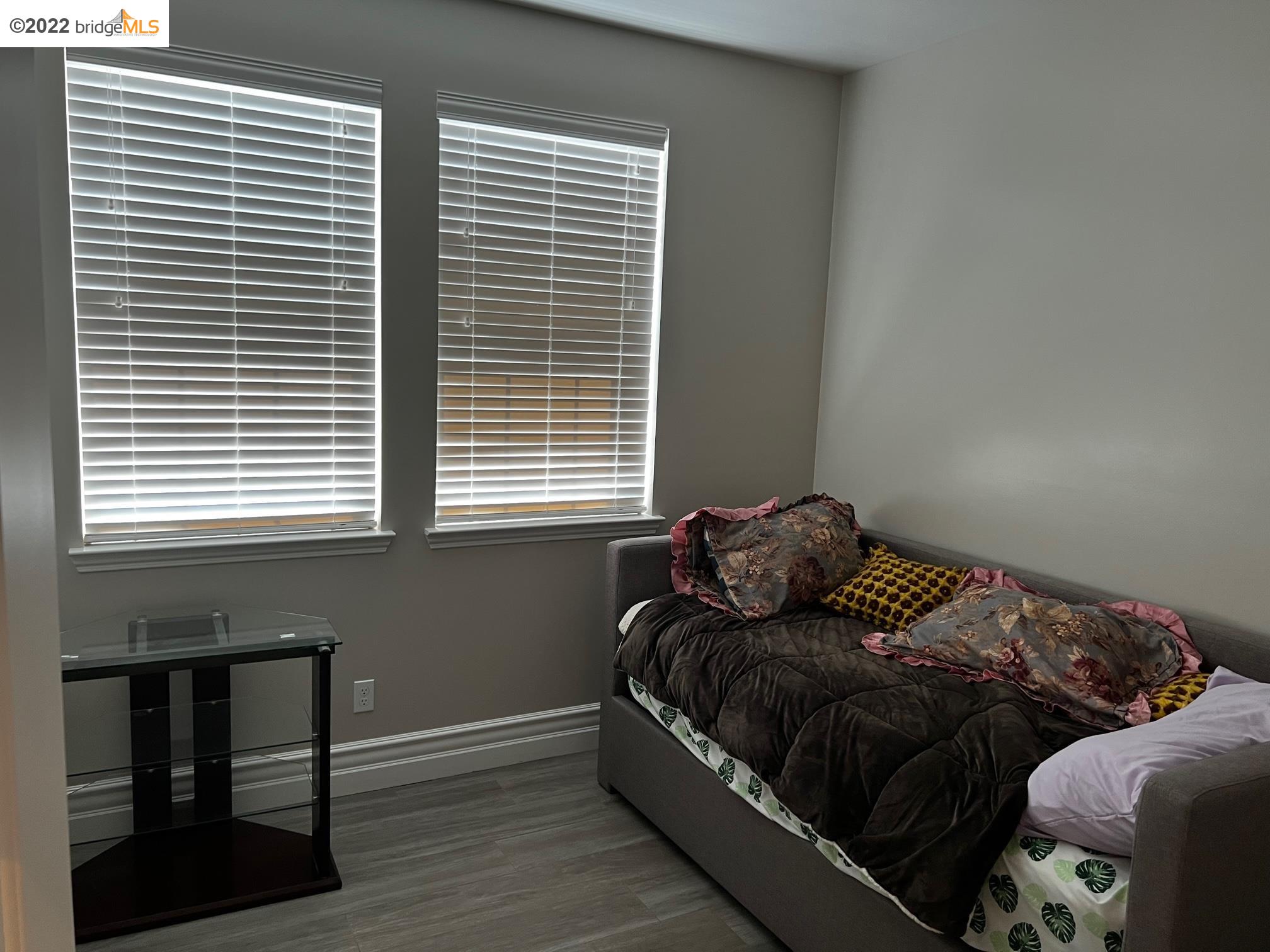 East Garrison Marina, CA 93933 - Photo 6 of 11 a bed sitting in a bedroom next to a window