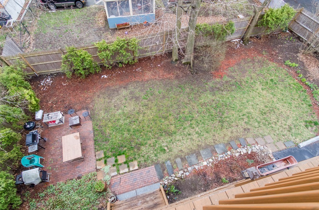 126 Minden Street, Unit 3 Boston, MA 02130 - Photo 11 of 12 a front view of a house with a yard