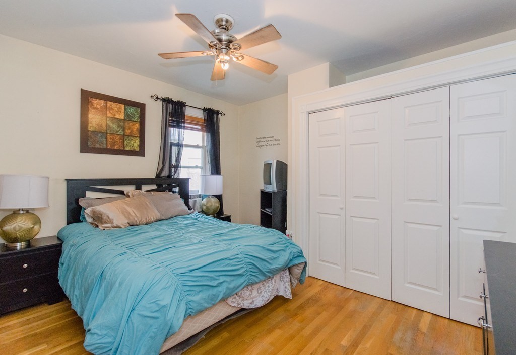 126 Minden Street, Unit 3 Boston, MA 02130 - Photo 6 of 12 a bedroom with a bed and a window