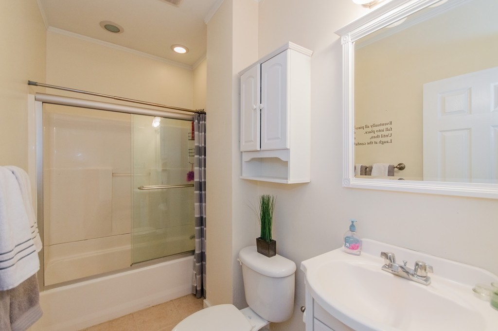 126 Minden Street, Unit 3 Boston, MA 02130 - Photo 8 of 12 a bathroom with a sink toilet and shower