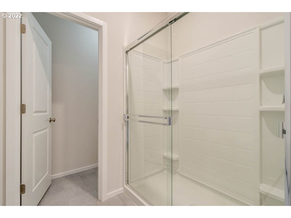 Undisclosed Address Eugene, OR 97404 - Photo 14 of 19 a bathroom with a shower