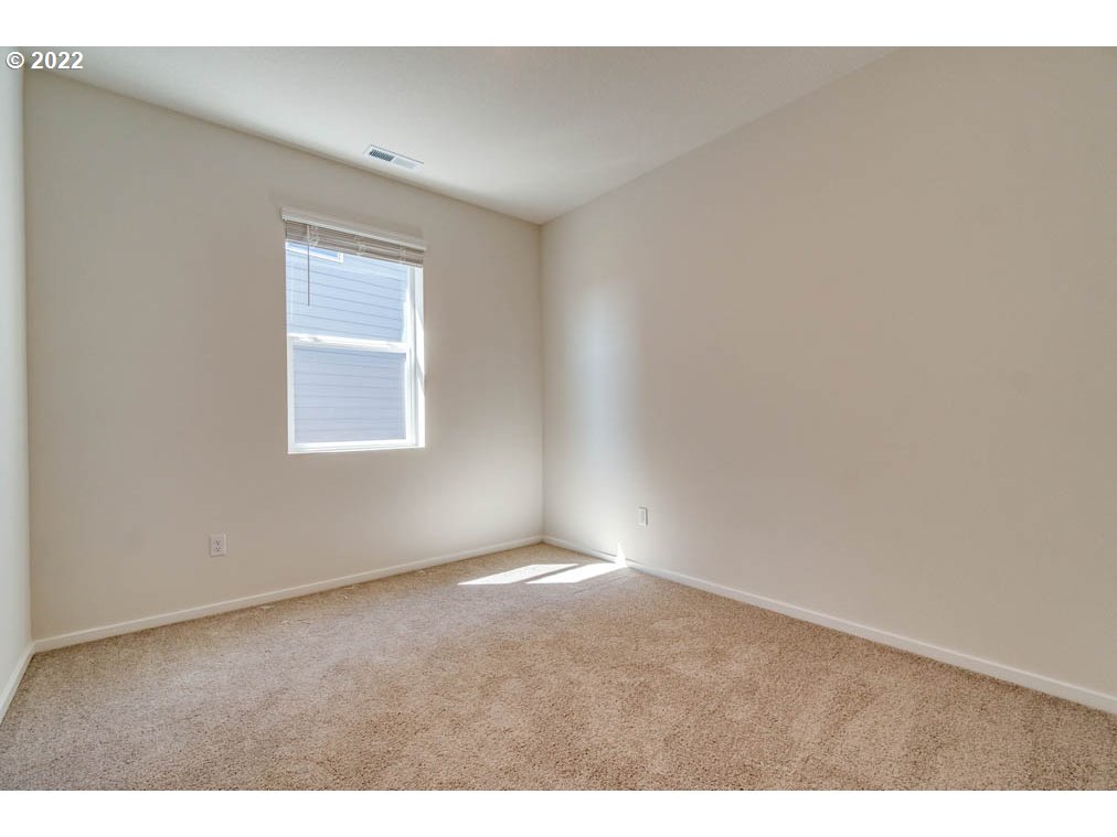 Undisclosed Address Eugene, OR 97404 - Photo 18 of 19 a view of an empty room with a window