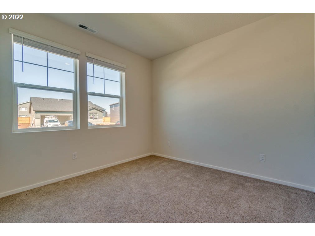 Undisclosed Address Eugene, OR 97404 - Photo 4 of 19 a view of an empty room with a window