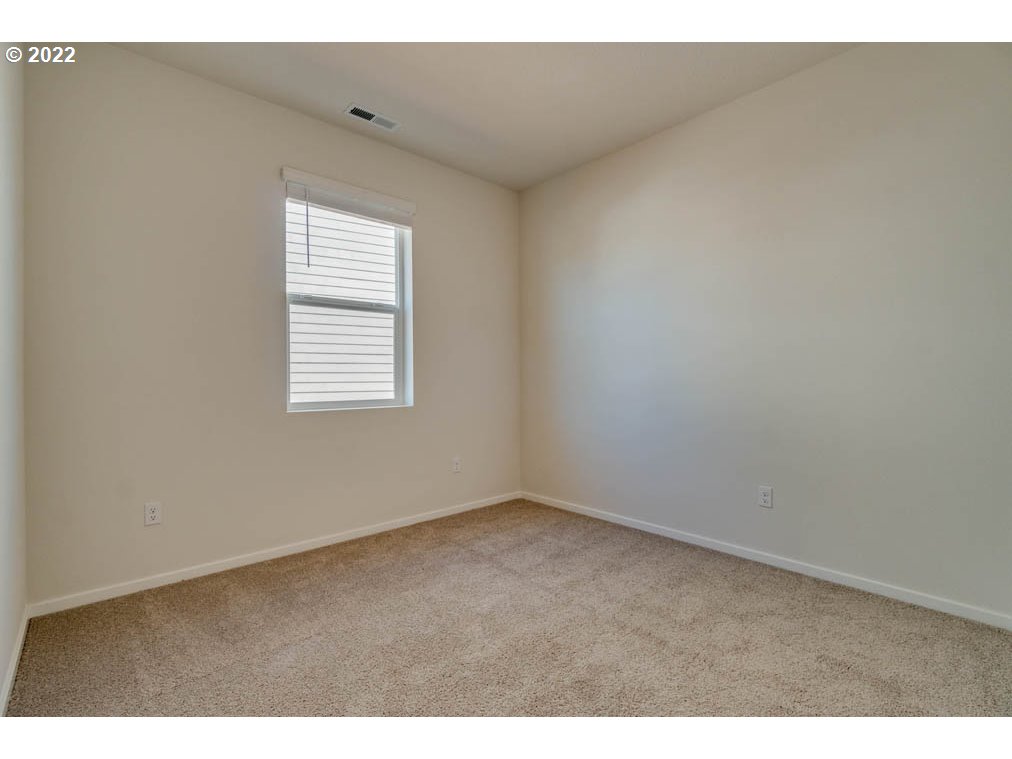 Undisclosed Address Eugene, OR 97404 - Photo 7 of 19 a view of an empty room with a window