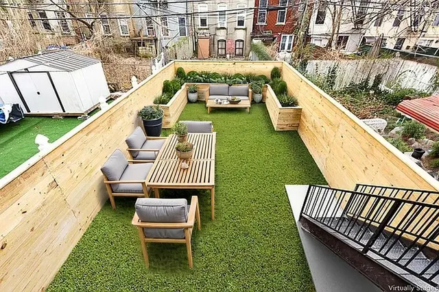 a balcony with view of swimming pool