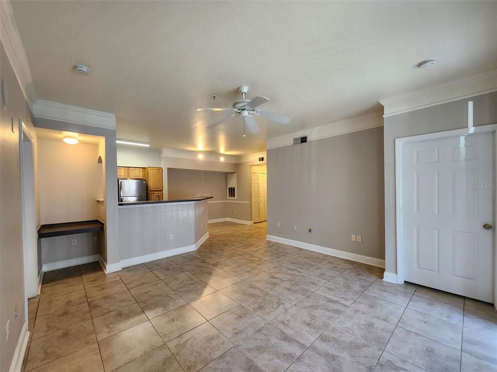 3250 Corona Village Way, Unit 101 Orlando, FL 32835 - Photo 11 of 31 a view of a hallway with a bathroom