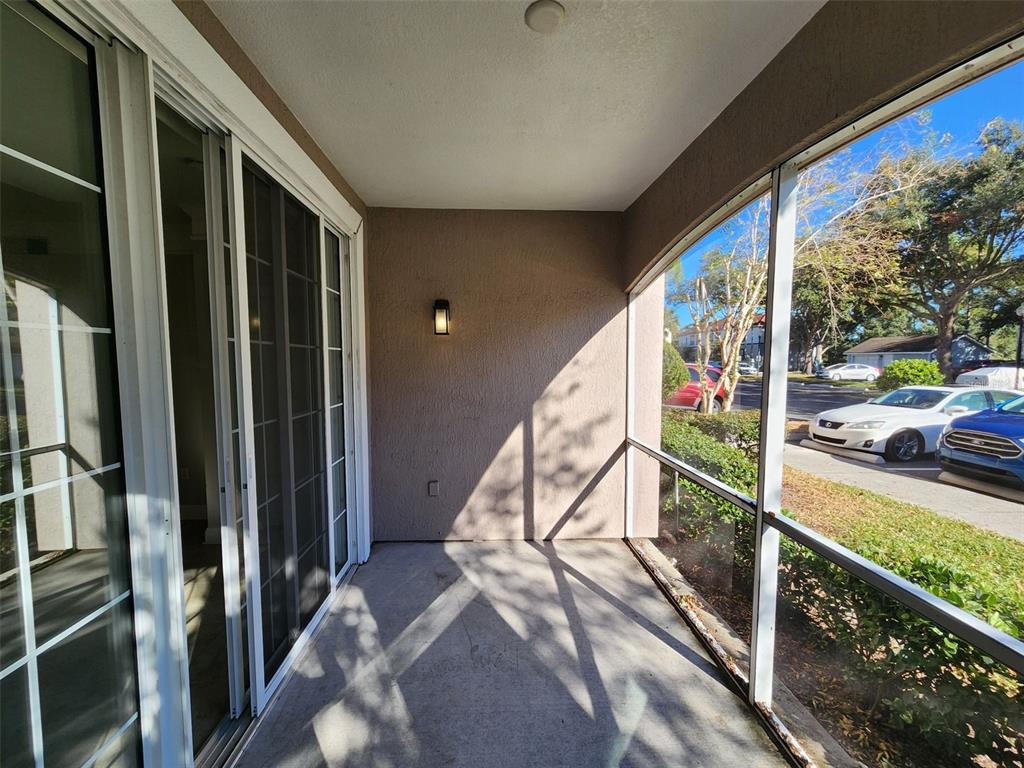 3250 Corona Village Way, Unit 101 Orlando, FL 32835 - Photo 23 of 31 a view of an outdoor seating space