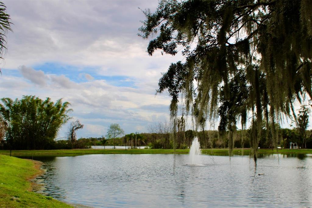 3250 Corona Village Way, Unit 101 Orlando, FL 32835 - Photo 29 of 31 a view of a lake view