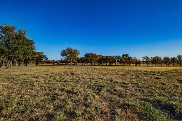 a view of an ocean and sunset