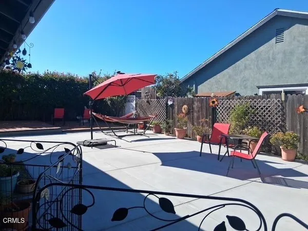 a view of a patio with swimming pool