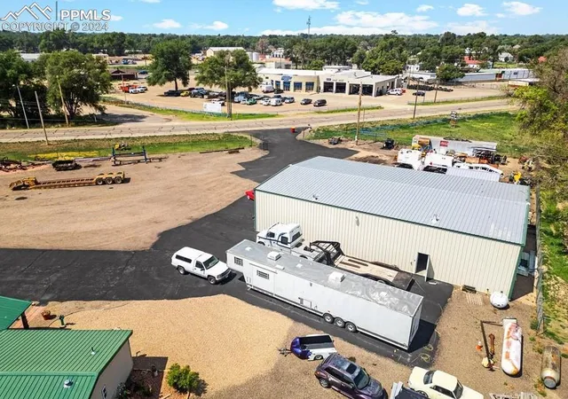 a view of a house with a street