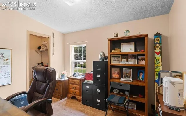 a room with furniture and a flat screen tv