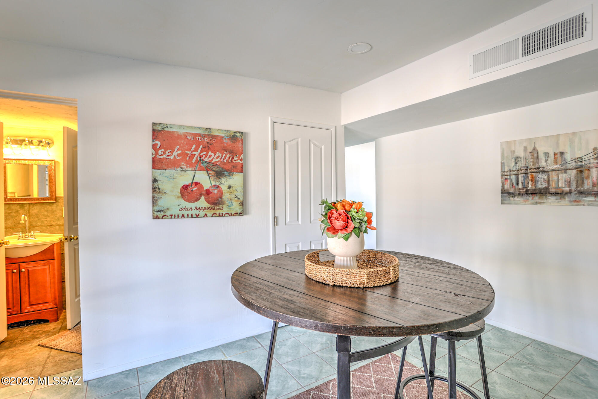 4400 West Ina Road Tucson, AZ 85741 - Photo 7 of 43 a view of a dining room with a table and chairs