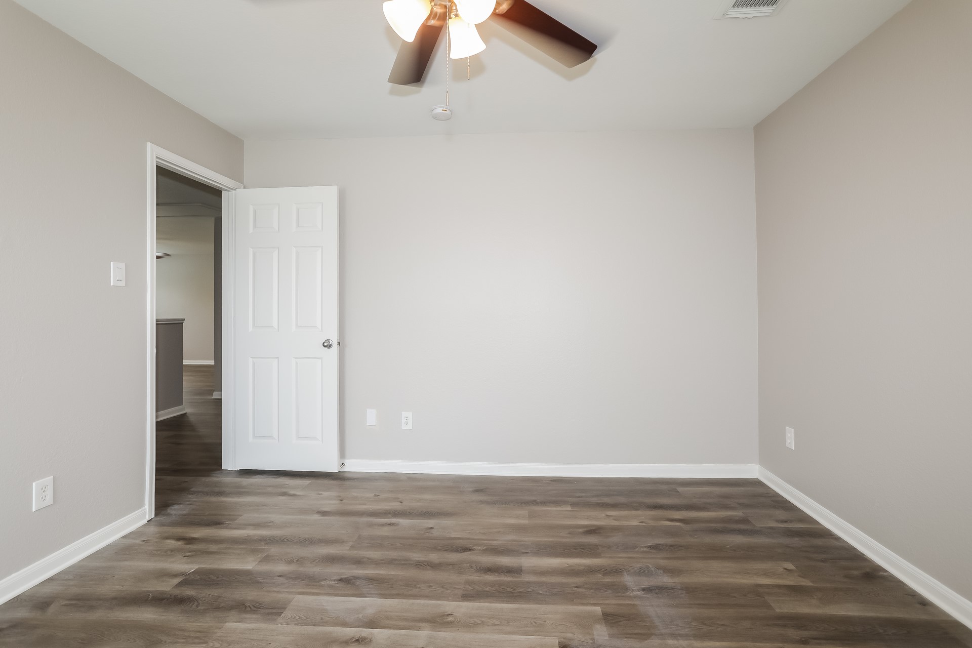 29511 Legends Pine Lane Spring, TX 77386 - Photo 14 of 17 a view of an empty room with wooden floor