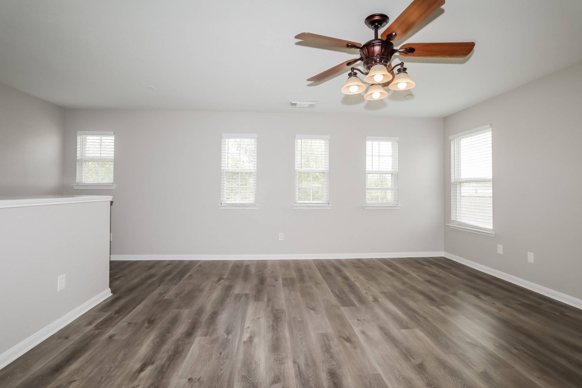 29511 Legends Pine Lane Spring, TX 77386 - Photo 8 of 17 wooden floor in an empty room with a window