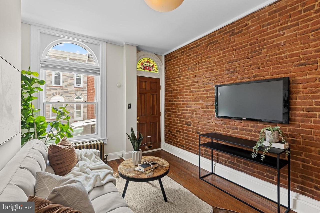 1444 Henry Street Baltimore, MD 21230 - Photo 5 of 18 Charming urban retreat with brick accents.