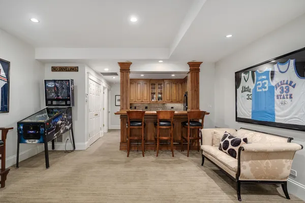 a bedroom with a bed and a desk