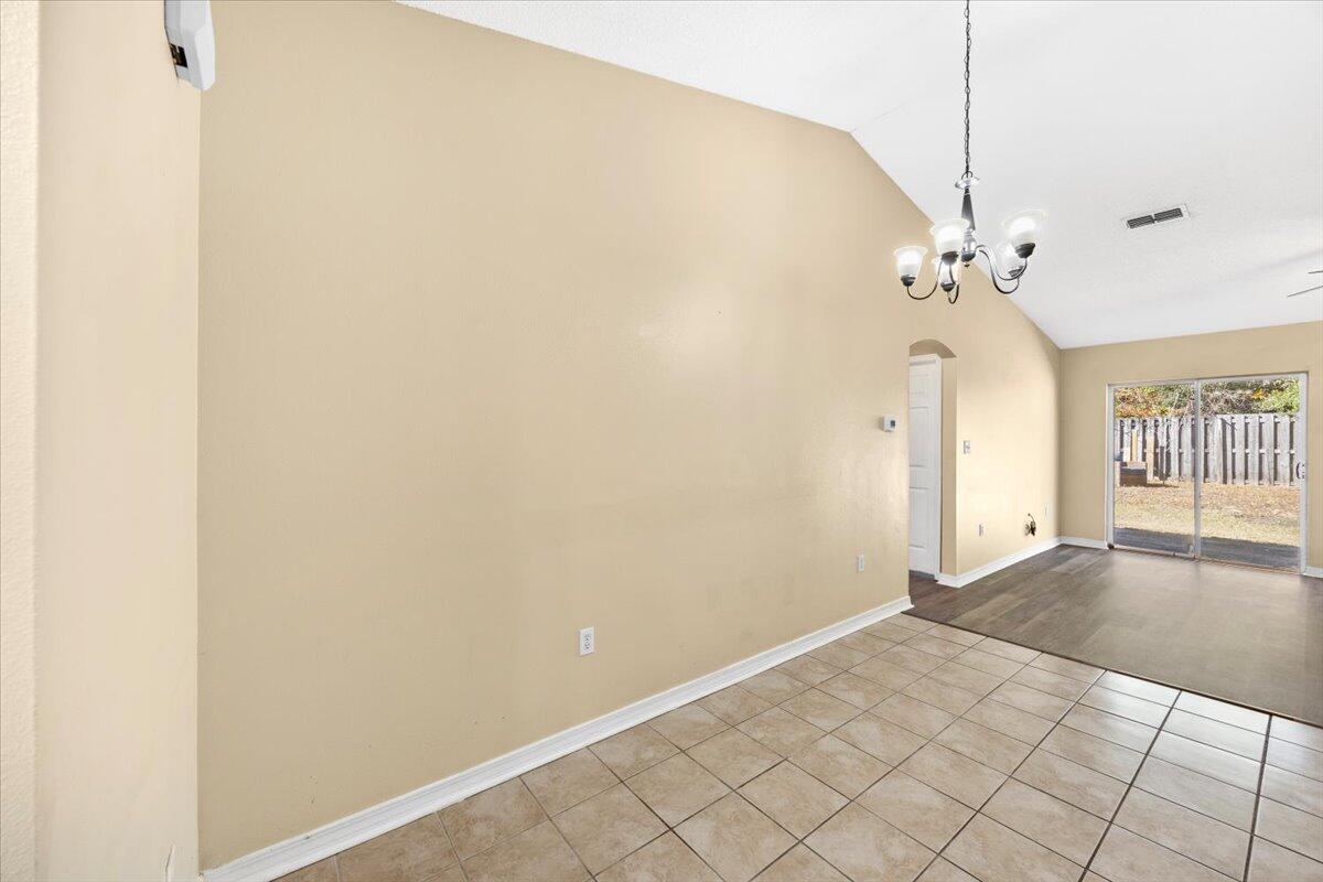 104 Cabana Way Crestview, FL 32536 - Photo 13 of 25 a view of a livingroom with a ceiling fan and window