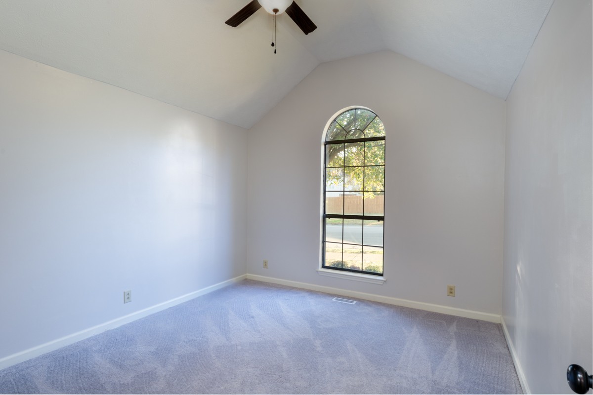 3817 Bryce Road Nashville, TN 37211 - Photo 19 of 26 an empty room with windows and ceiling fan