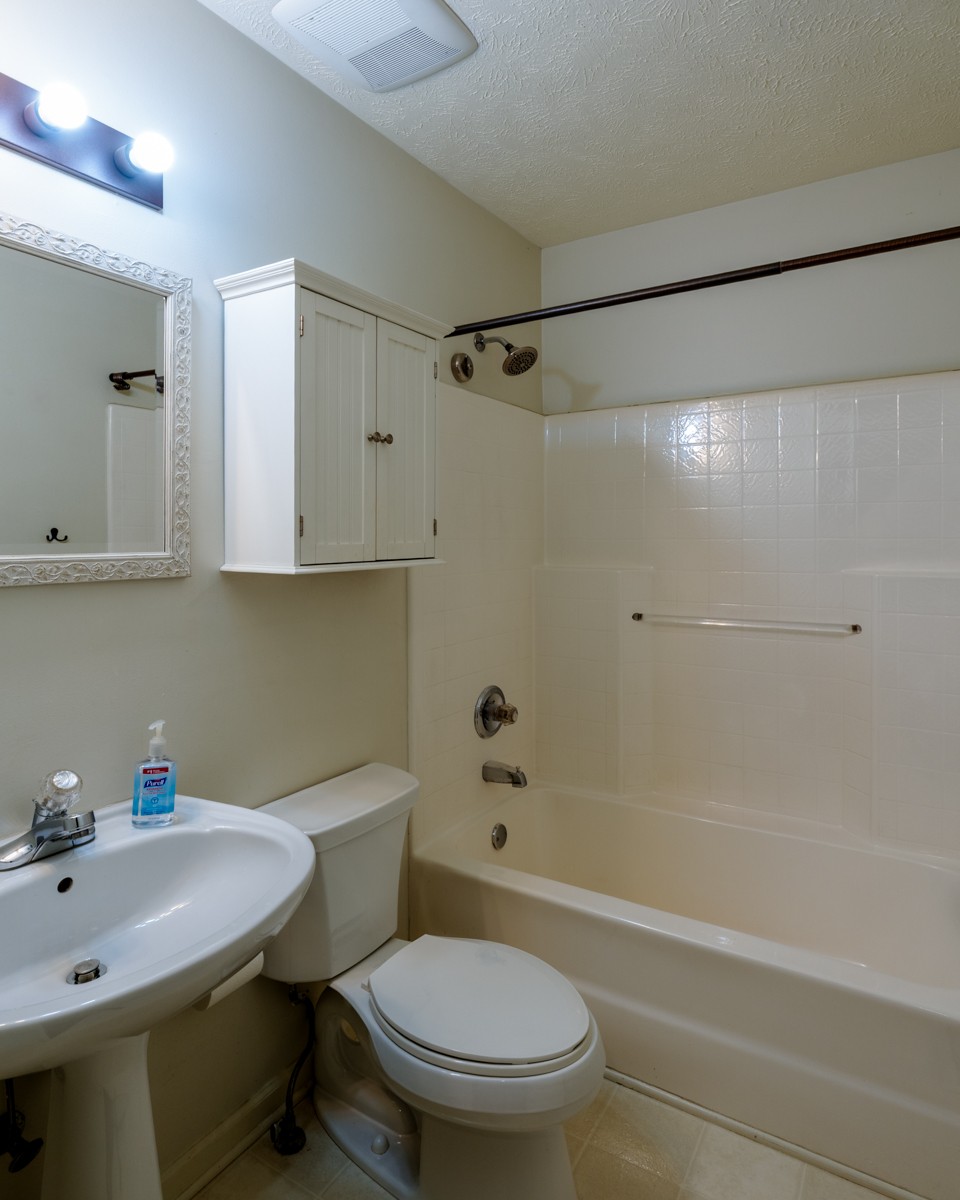 3817 Bryce Road Nashville, TN 37211 - Photo 20 of 26 a bathroom with a sink toilet and shower
