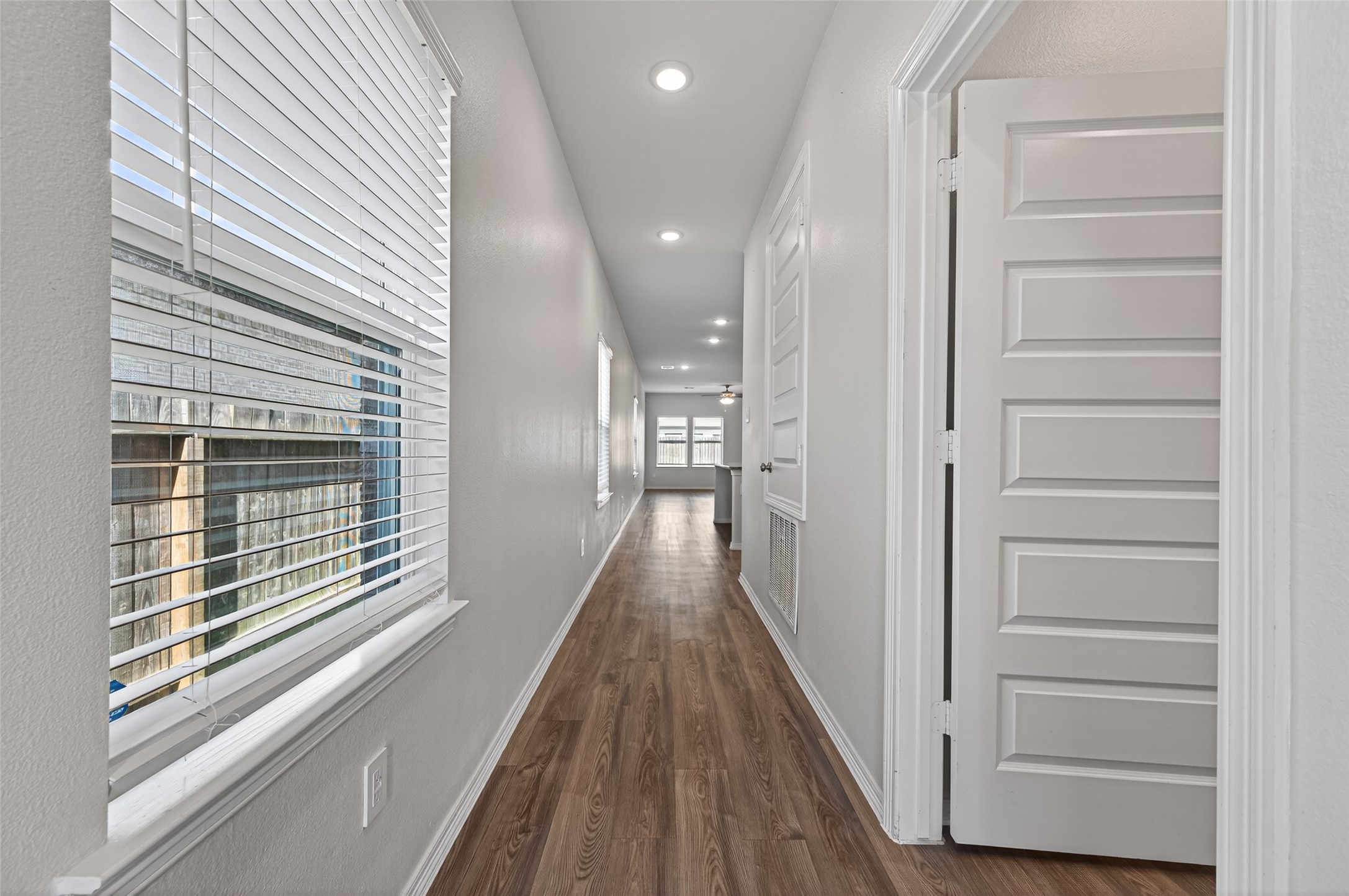23222 Spring Genesis Lane Katy, TX 77493 - Photo 7 of 43 The inviting, expansive walkway provides access to a spacious and charming living area.