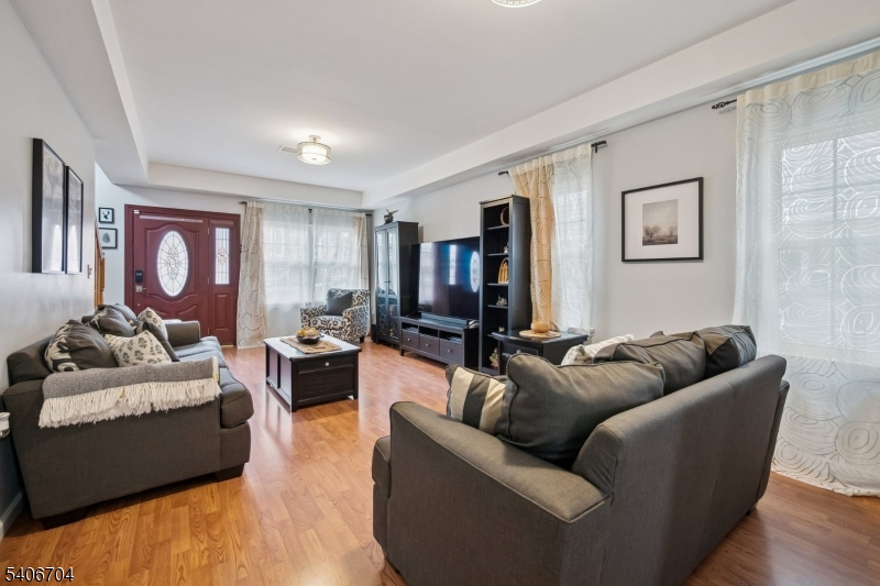 111 Todd Street Linden, NJ 07036 - Photo 5 of 34 a living room with furniture and a window