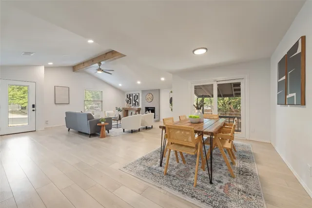 a living room with furniture and a table