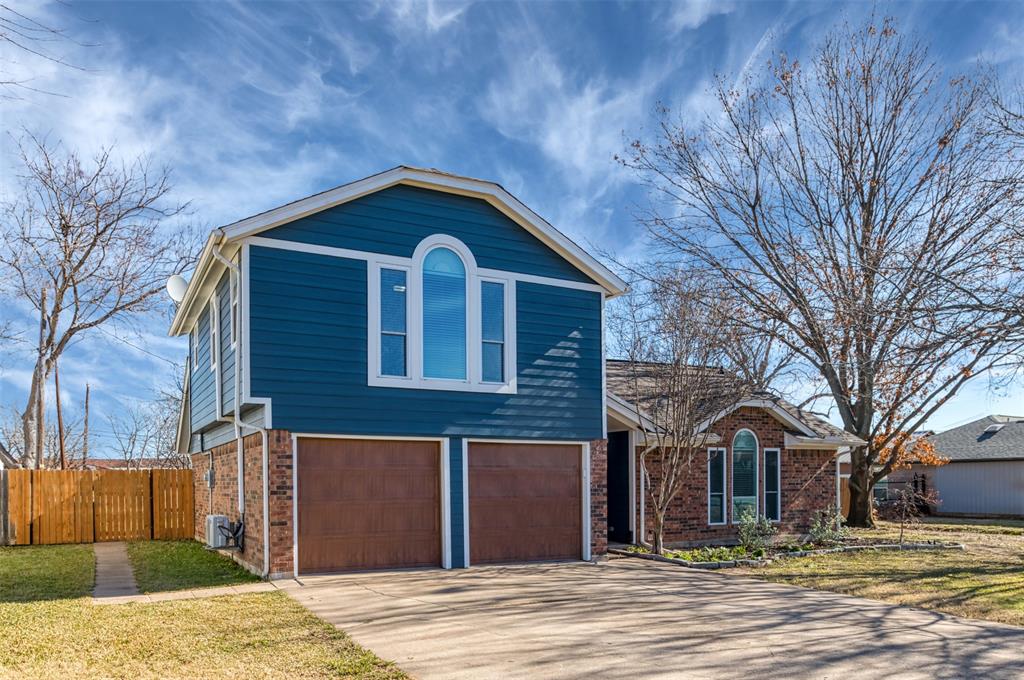 485 Ashley Lane Roanoke, TX 76262 - Photo 2 of 28 a front view of a house with a yard