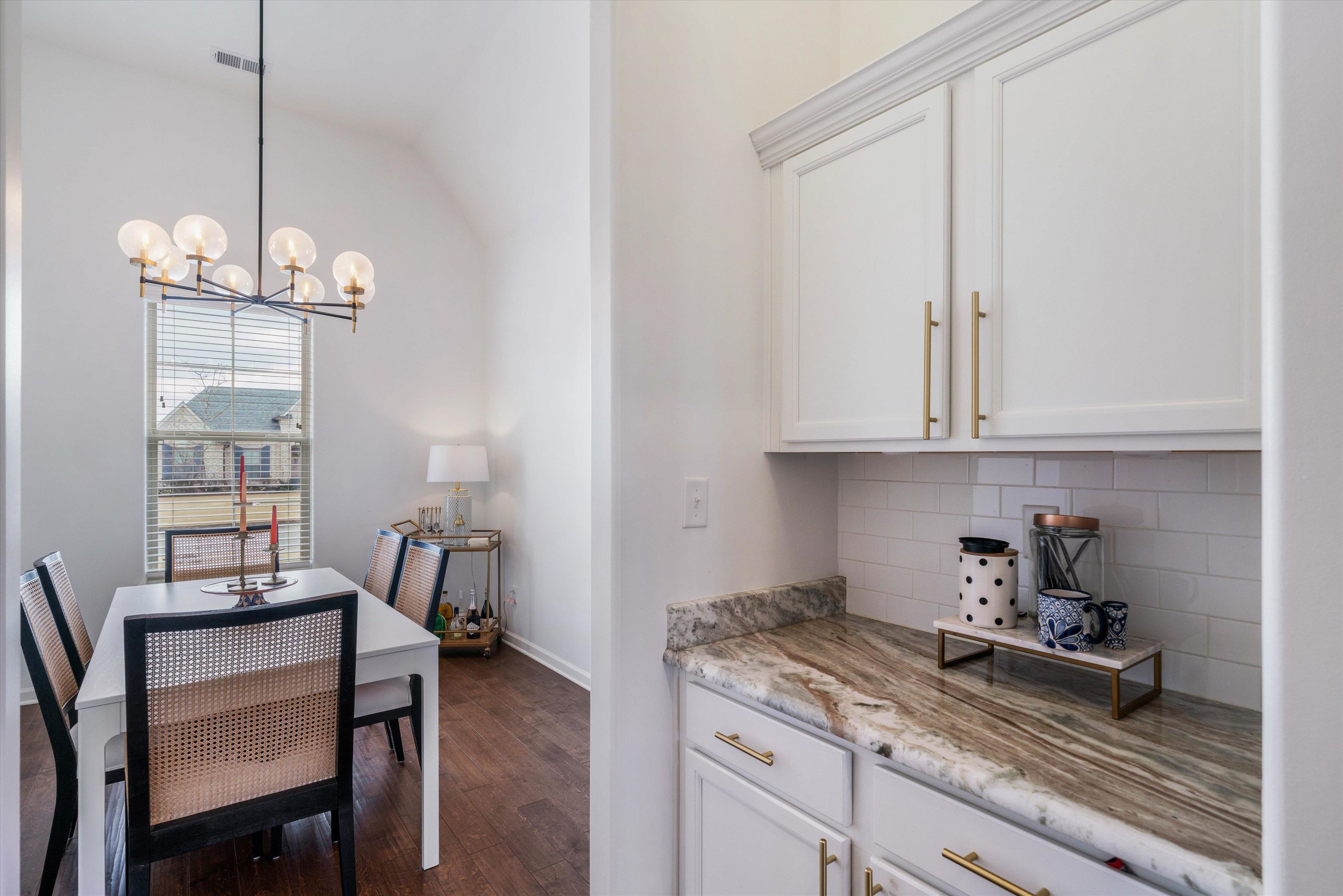75 Cypress Point Road Oakland, TN 38060 - Photo 12 of 38 a view of a kitchen area with furniture and wooden floor
