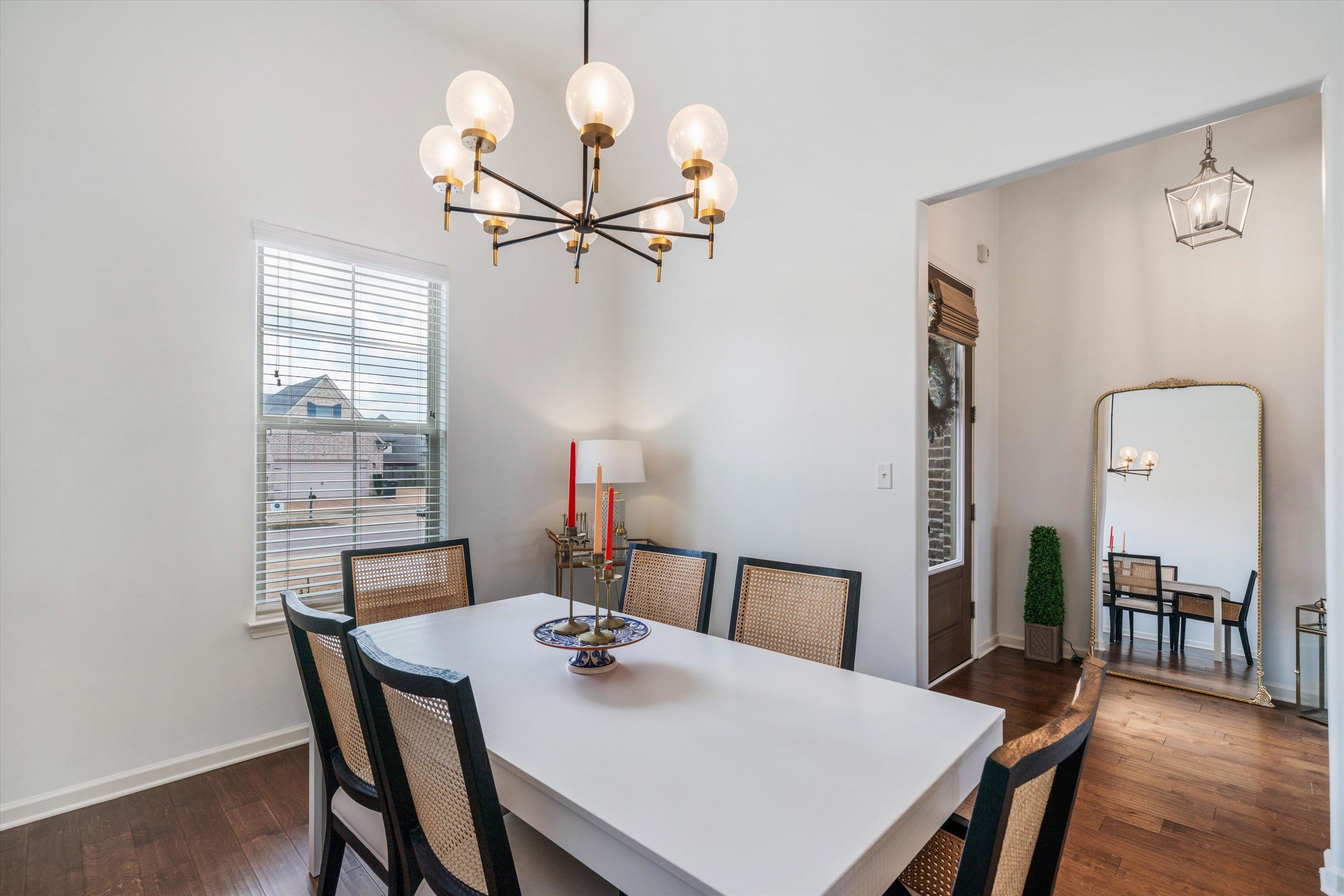 75 Cypress Point Road Oakland, TN 38060 - Photo 13 of 38 a view of a dining room with furniture window and wooden floor