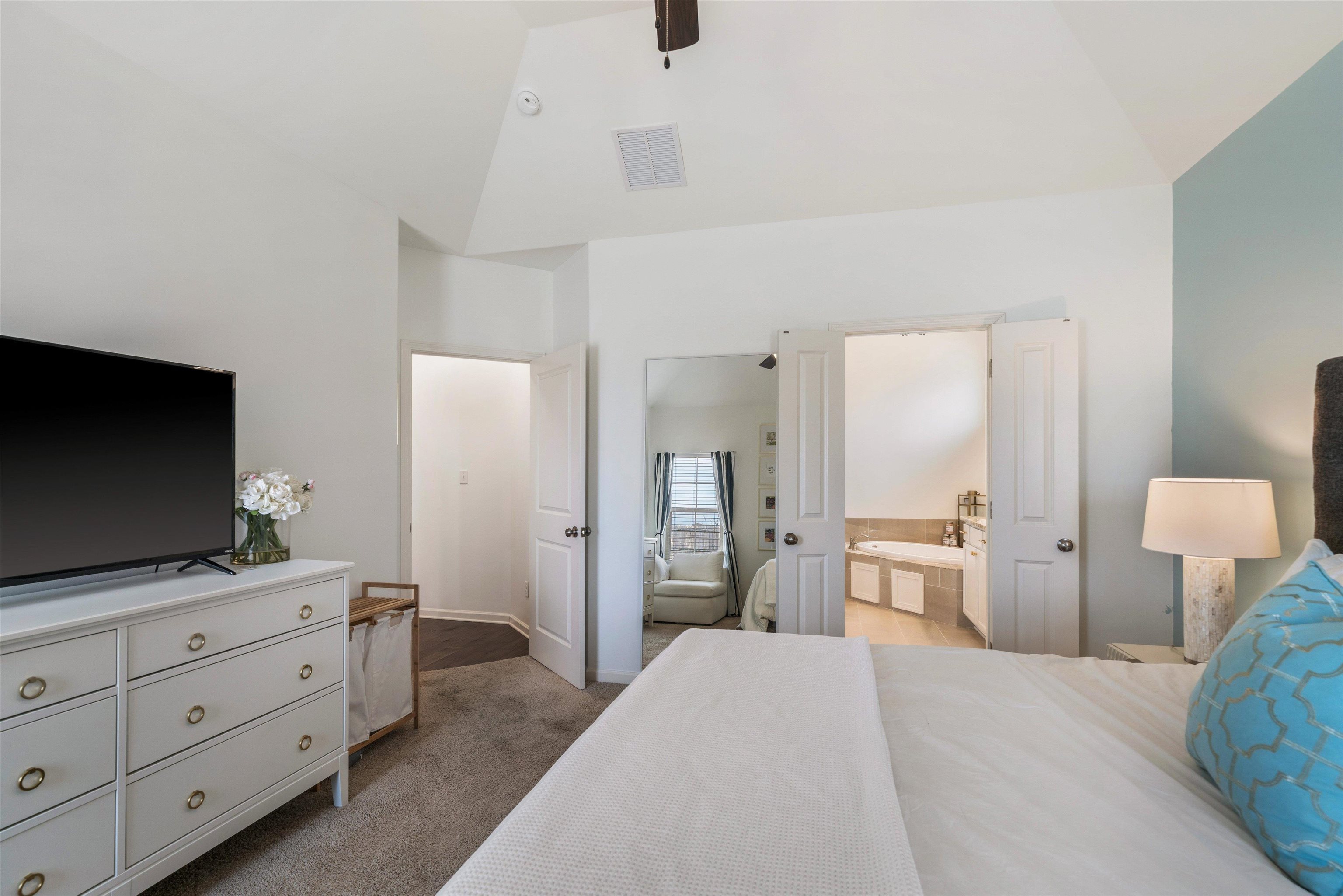 75 Cypress Point Road Oakland, TN 38060 - Photo 15 of 38 a spacious bedroom with a bed and a flat screen tv