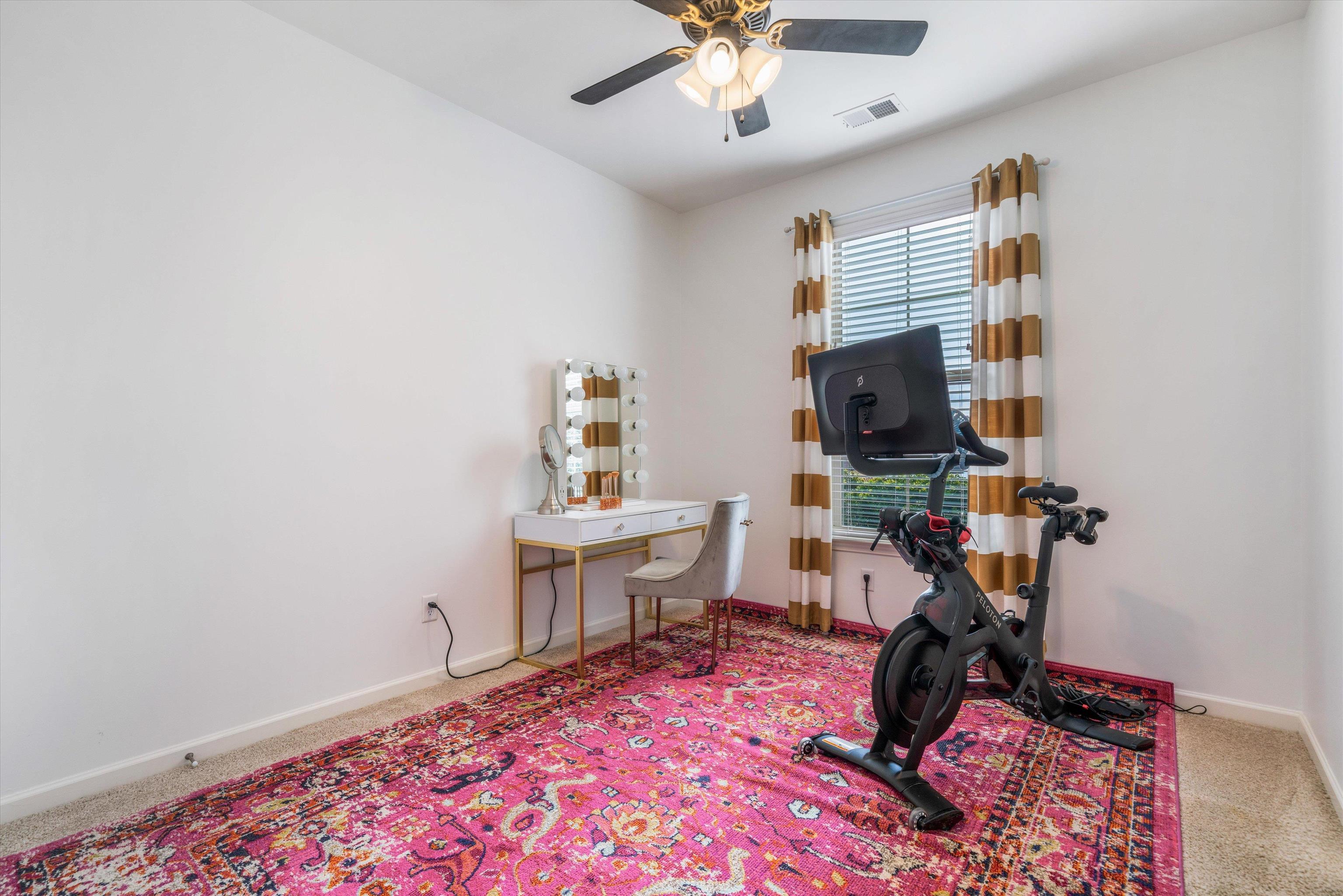 75 Cypress Point Road Oakland, TN 38060 - Photo 19 of 38 a living room with furniture a flat screen tv and a window