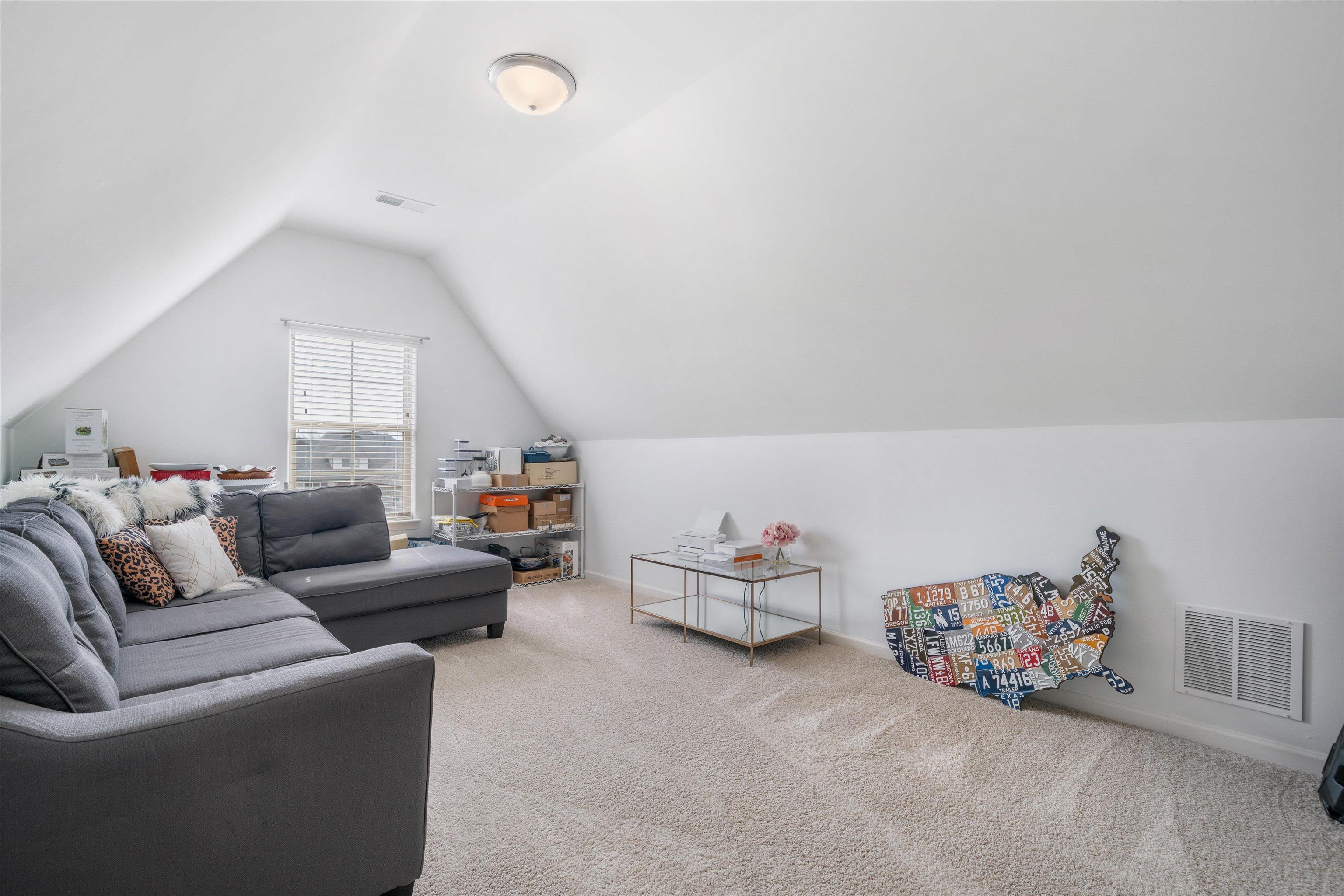 75 Cypress Point Road Oakland, TN 38060 - Photo 24 of 38 a living room with furniture and a window