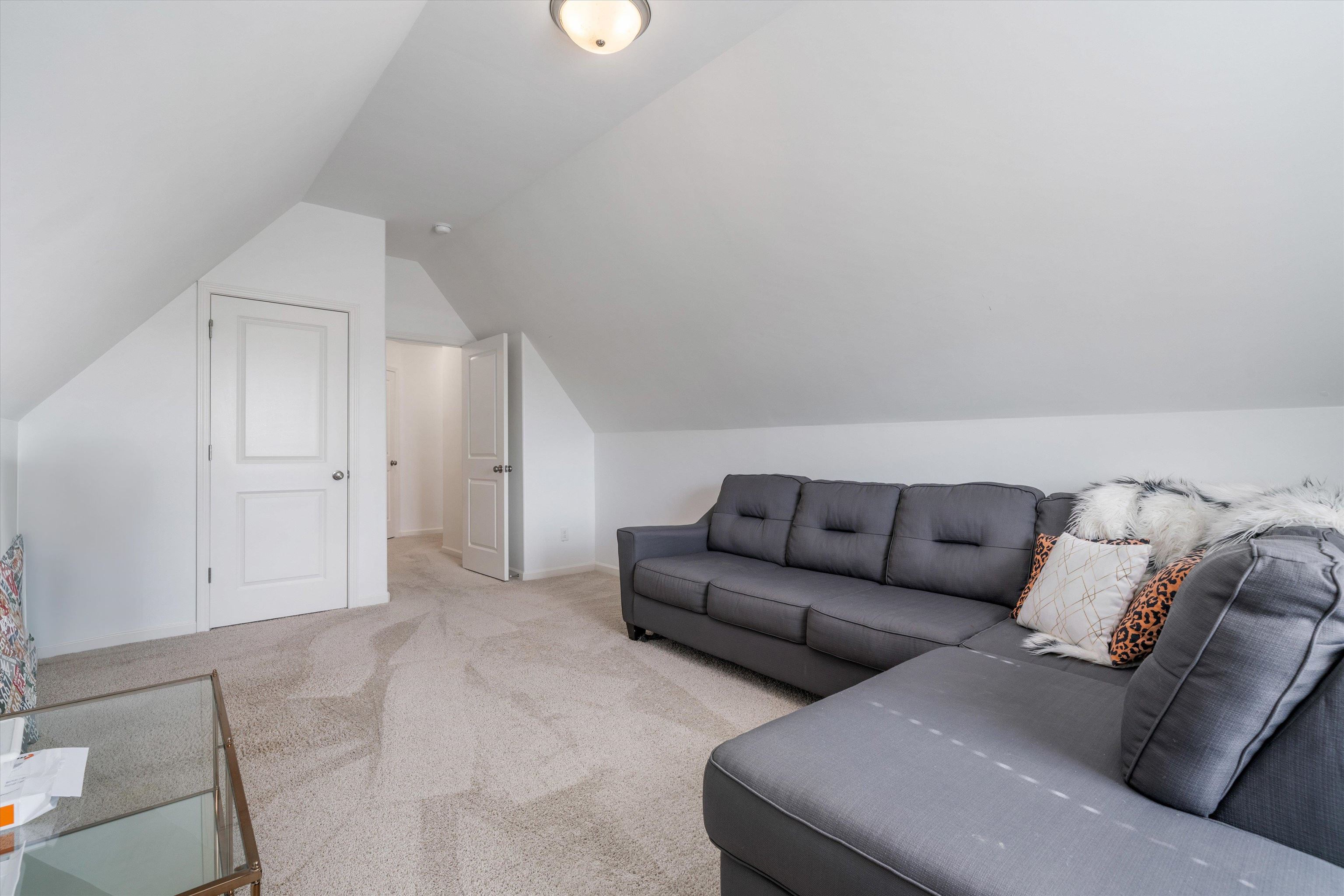 75 Cypress Point Road Oakland, TN 38060 - Photo 25 of 38 a living room with furniture and white walls
