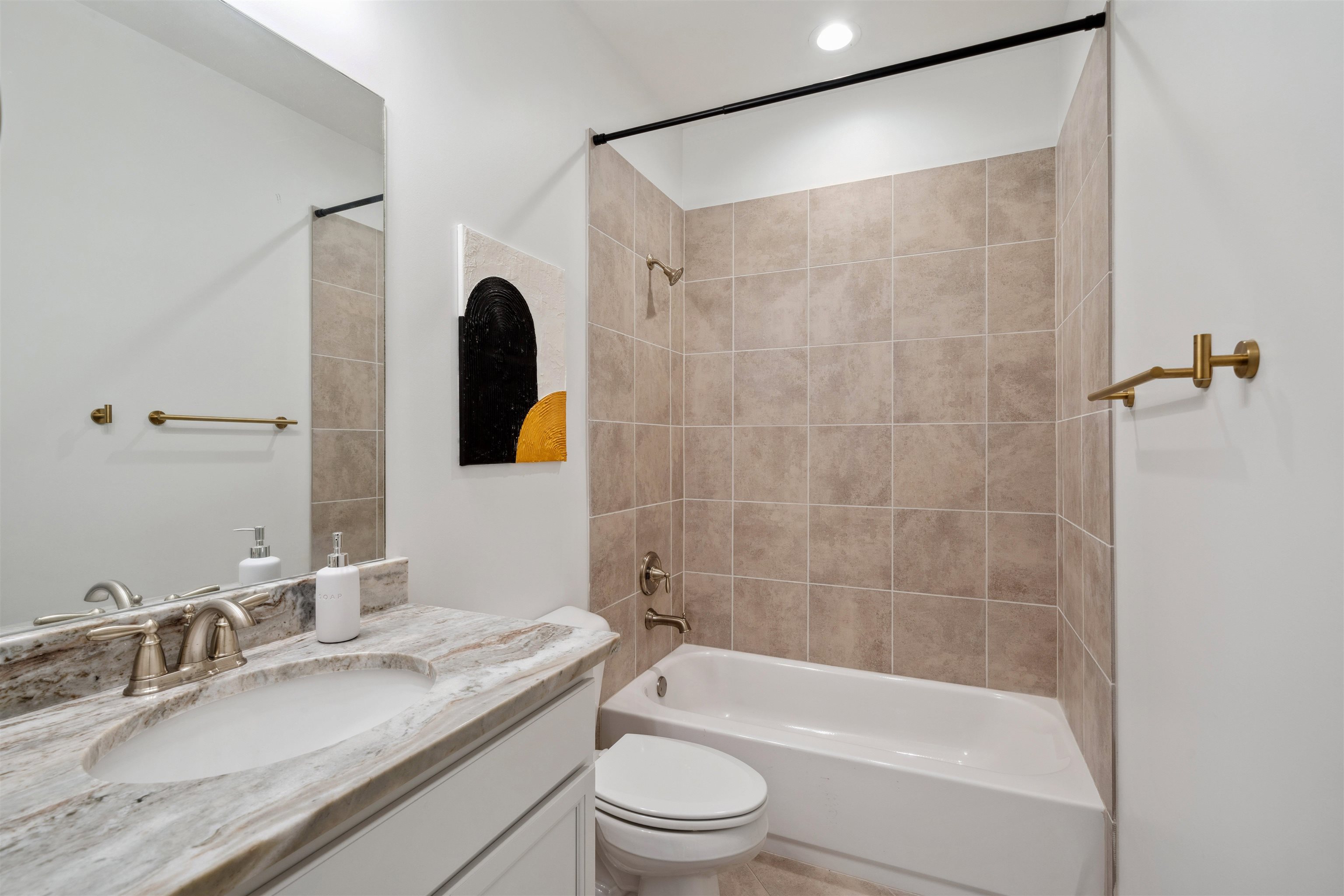75 Cypress Point Road Oakland, TN 38060 - Photo 26 of 38 a bathroom with a granite countertop sink toilet and shower