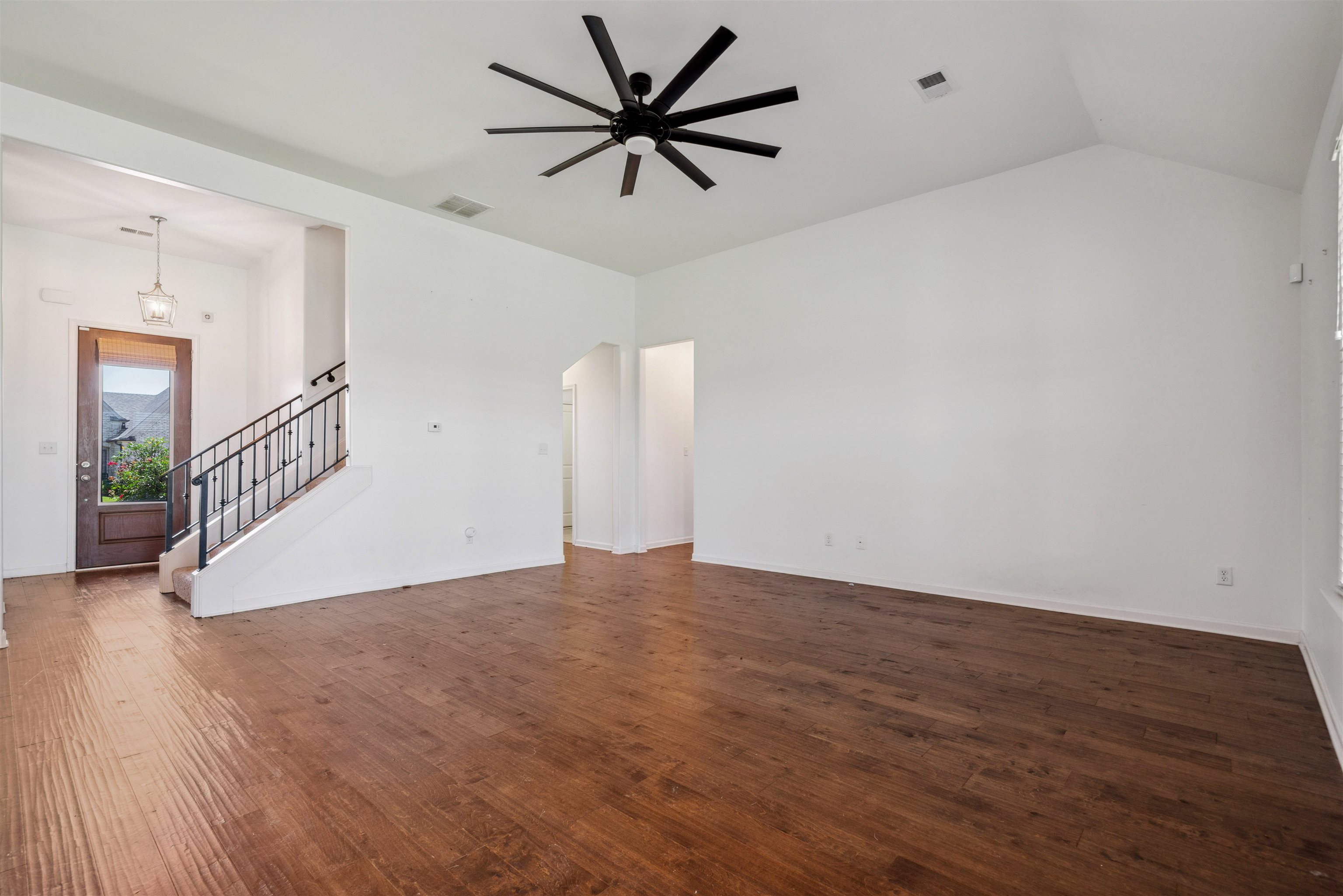75 Cypress Point Road Oakland, TN 38060 - Photo 31 of 38 a view of a livingroom with a ceiling fan and window