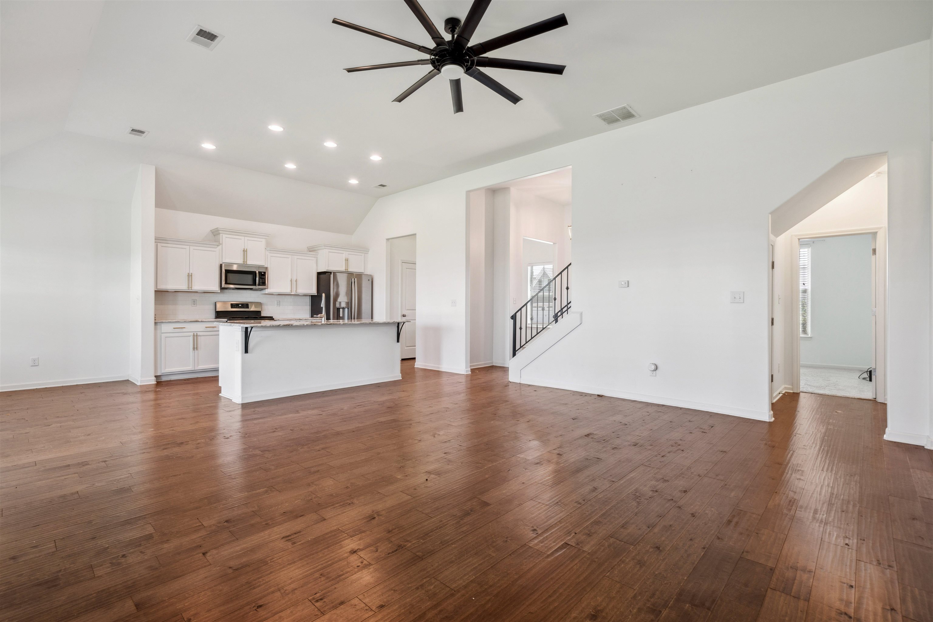 75 Cypress Point Road Oakland, TN 38060 - Photo 32 of 38 a view of a kitchen with a sink and wooden floor