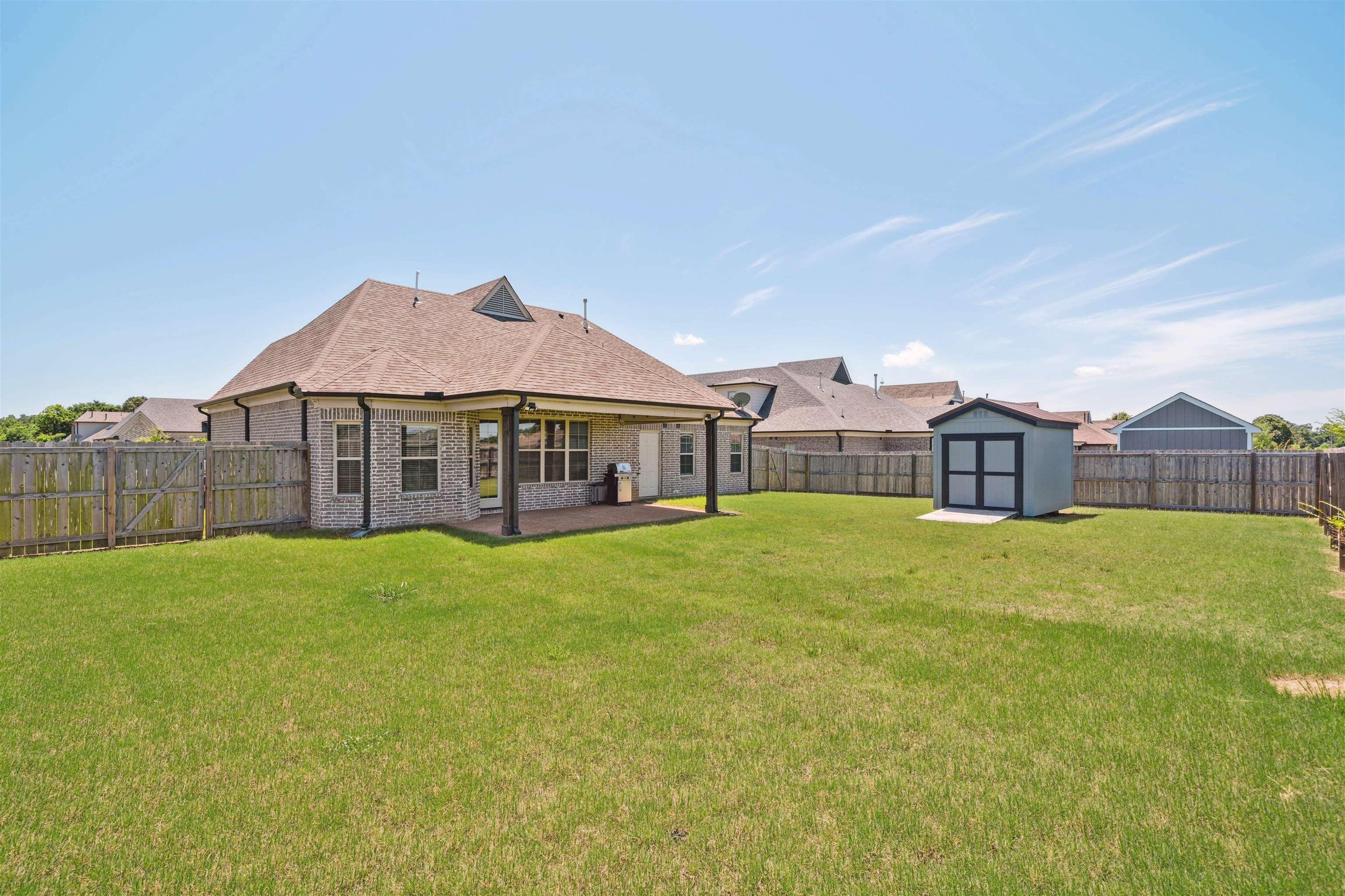 75 Cypress Point Road Oakland, TN 38060 - Photo 37 of 38 a house view with a garden space