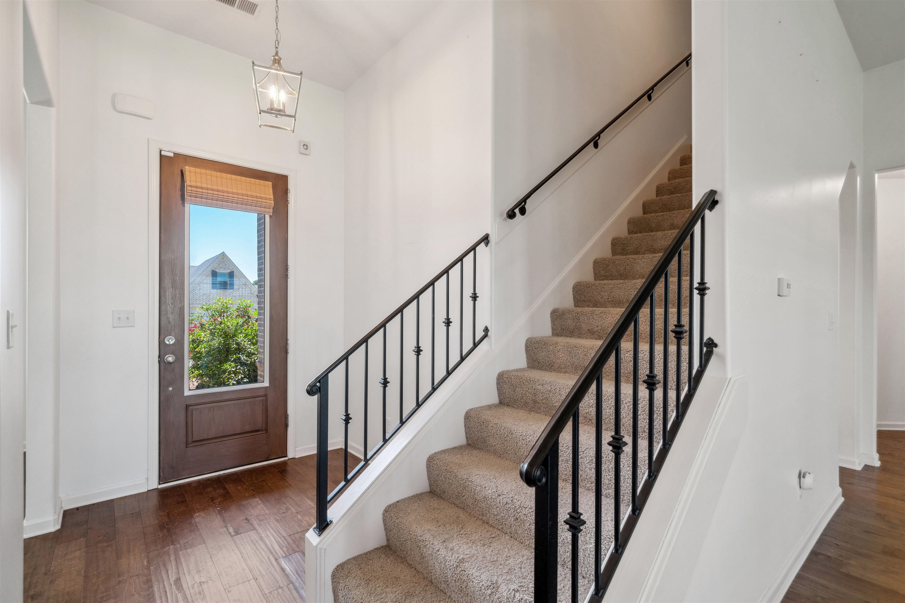 75 Cypress Point Road Oakland, TN 38060 - Photo 4 of 38 a view of staircase with wooden floor and stairs