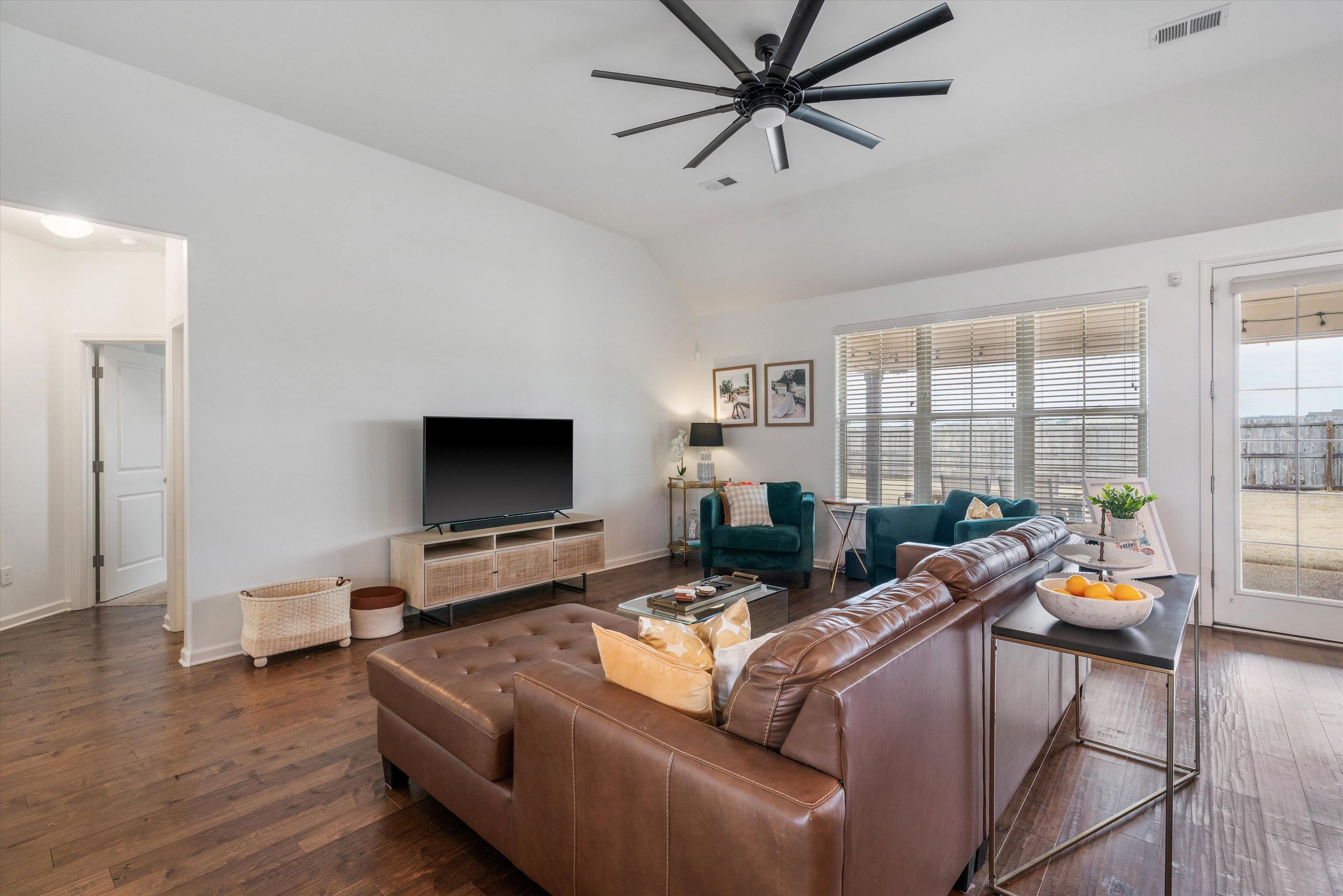 75 Cypress Point Road Oakland, TN 38060 - Photo 7 of 38 a living room with furniture and a flat screen tv
