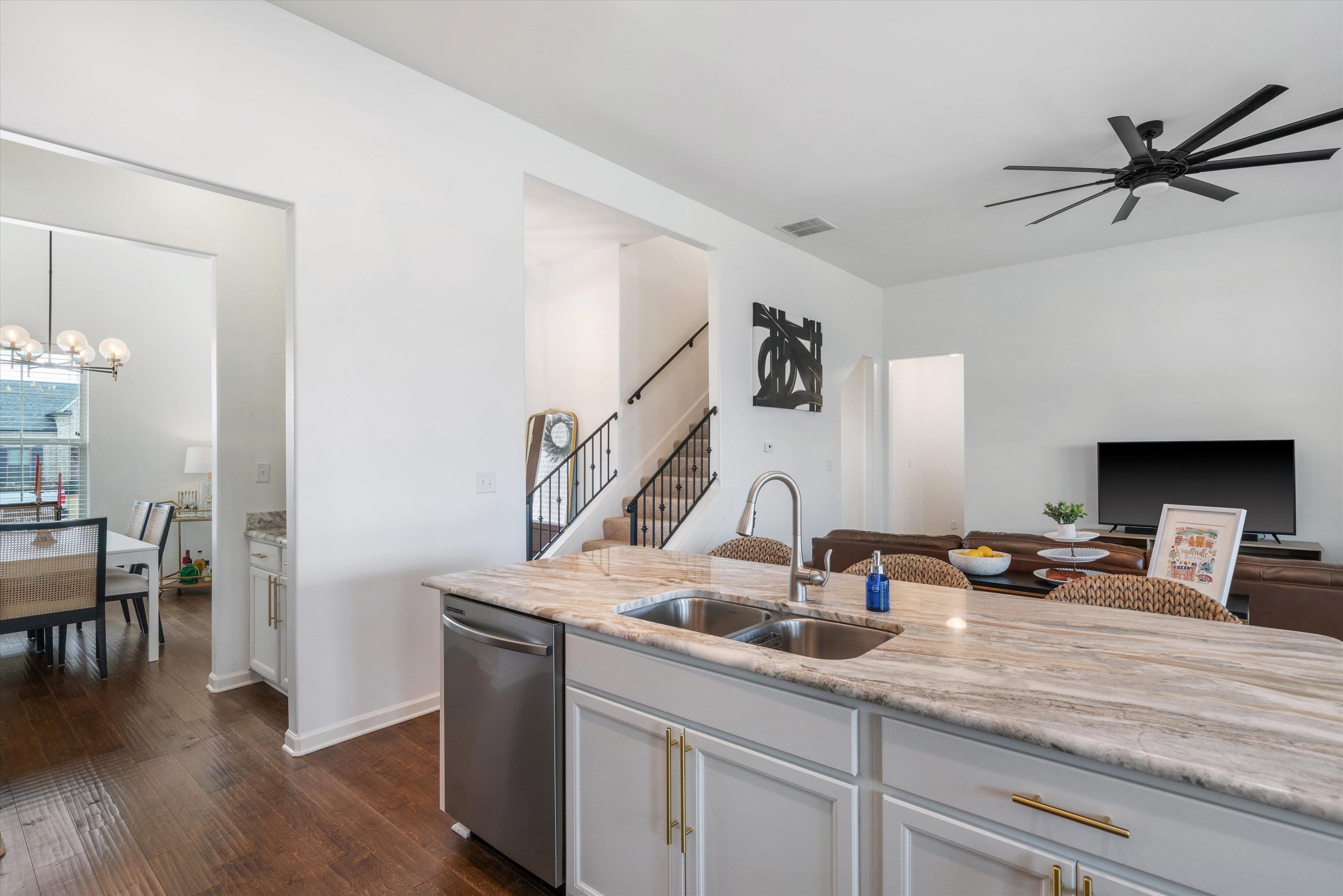 75 Cypress Point Road Oakland, TN 38060 - Photo 9 of 38 a kitchen with a sink cabinets and wooden floor