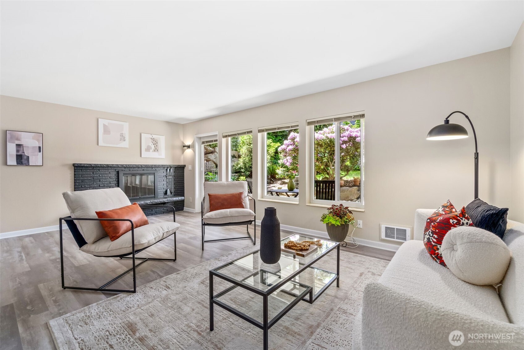 75 East Lynn Street, Unit B Seattle, WA 98102 - Photo 5 of 36 a living room with furniture and a large window