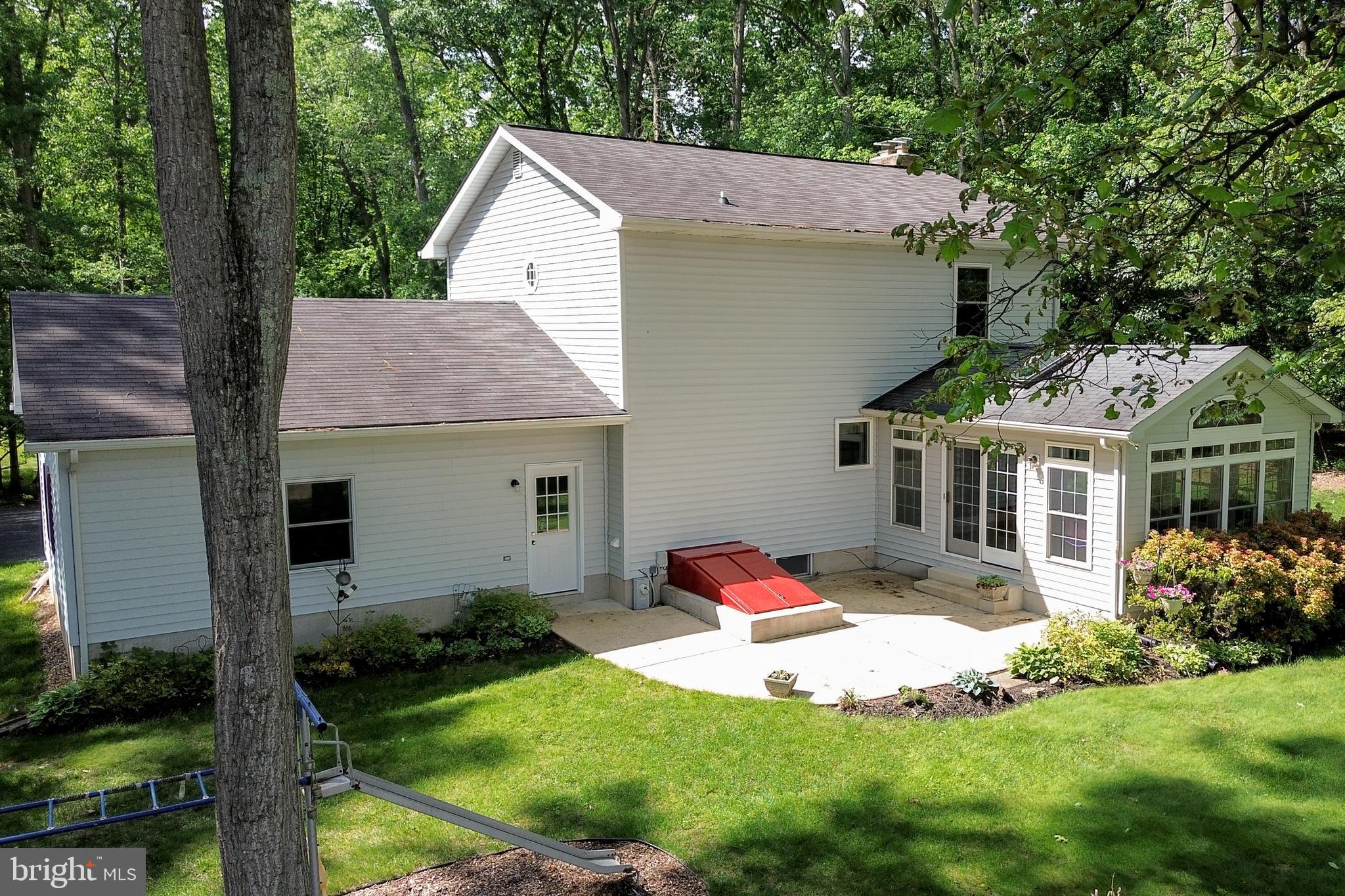 5313 Wentz Road Manchester, MD 21102 - Photo 45 of 51 a view of a house with backyard and garden