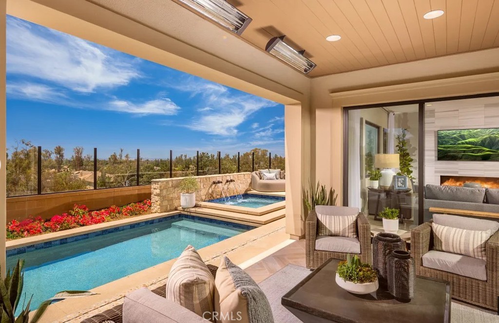 416 Milpas Irvine, CA 92602 - Photo 3 of 7 a view of a living room and dining room